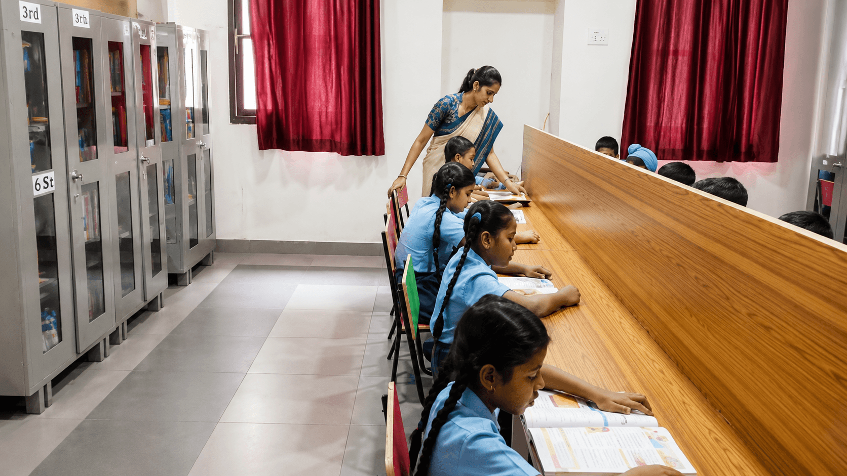 Students reading in the school library